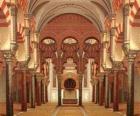 Old Mosque of Cordoba, the current cathedral, marble columns and arches with the holy place, the Mihrab