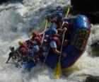 Adventurers down the river with an inflatable boat