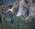 Slacklining is a practice in balance that uses 1 inch nylon webbing tensioned between two anchor points