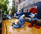 The Smurfs on the roof of a taxi