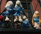 The Smurfs ready to jump from the balcony