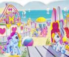 Several small ponies on the beach. Mein kleines Pony