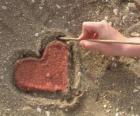 Heart drawn in the sand