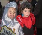 Boy and girl dressed for Carnival