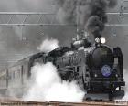 Steam train running toward their destination