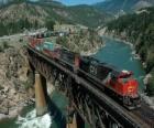 Train of goods passing over a bridge