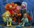 Several Muppets singing