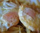 Fried eggs with potatoes