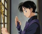 Miroku, a Buddhist monk traveling to make a living doing exorcisms