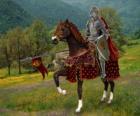 Knight with helmet and armor and with his spear ready mounted on his horse
