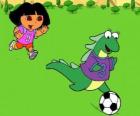 Dora playing soccer with her friend Isa the iguana