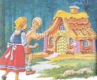 The two siblings Hansel and Gretel discover a house made of delicious candy