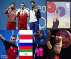 Podium weightlifting men 85 kg, Adrian Frantsevich (Poland), fitness Aujadov (Russia) and (Iran) - London 2012 - Kianoush Rostami