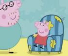 Peppa Pig sitting in the old Chair of his father