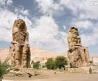 The Colossi of Memnon statues of Pharaoh Amenhotep III, Luxor, Egypt