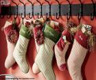 Stockings hung with Christmas gifts