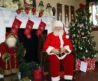 Santa Claus sitting in front of the fireplace