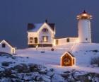 Lighthouse and lighthouse keeper's house with Christmas decorations