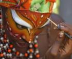 Girl is preparing for the Carnival parade