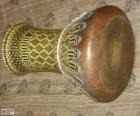 The goblet drum, also chalice drum, darbuka, debuka, Kratom, doumbek, dumbec, or tablah