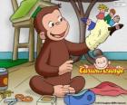 The curious monkey George makes puppets