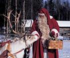 Santa Claus giving feed the reindeer