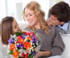 Mom receiving a bouquet of flowers