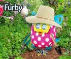 Funny Furby gardener with hat and tools for working in the garden