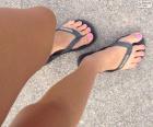Beautiful legs and feet with nails painted pink