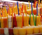 Natural fruit juices and each with its straw