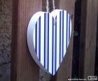 Wooden heart, white and stripes blue to decorate for Valentine's day