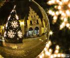 Reflection of a tree of Christmas on a Golden Ball