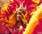 Girl dancing at Carnival with a lovely orange dress