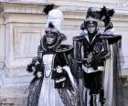 Two elegant costumes to attend the big dance of Carnival of Venice