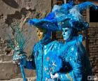 Couple with bright blue costumes