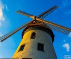 View of a windmill with three windows