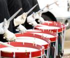 Several drums during a parade