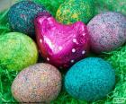 Nest of Easter, pink hen and six eggs of colors