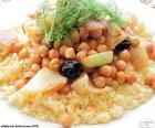 Couscous is a Berber dish made with wheat semolina, in this case served with chickpeas and vegetables