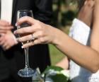 The bride with a glass of champagne