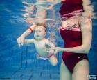 Baby swimming is an activity that parents and children jointly developed