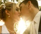 The bride and groom Kiss