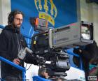 Cameraman from television during a broadcast of a sporting event