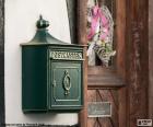 A green mailbox to receive correspondence