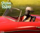 The sheep Shaun driving a red convertible car