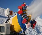 Snow Cannon making snow on a ski slope