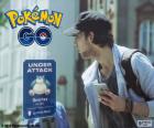 A Pokémon GO player detects that the Pokémon is being attacked by an unknown attacker who is close and try to locate it