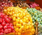 The colors of them candies usually indicate their flavors strawberry, lemon, mint etc...