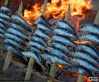 Sardines cooked with firewood