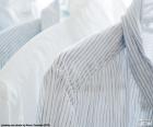 Dress shirt of man hanging from the hangers